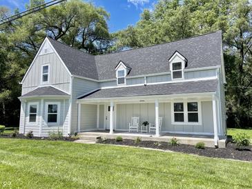 Newly renovated farmhouse with front porch at 22133 State Road 37 N, Noblesville, IN 46060