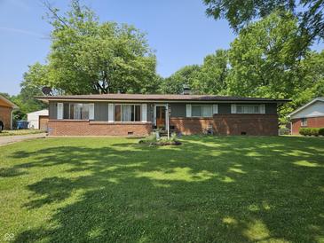 Photo one of 1414 N Banner Ave Indianapolis IN 46214 | MLS 21988217