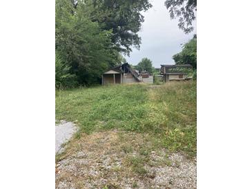 Image shows a damaged house needing repairs at 3343 S Lyons Ave, Indianapolis, IN 46221