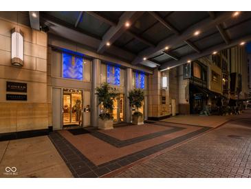 Conrad Hotel entrance at night, with blue lighting at 1 N Illinois St # 2101, Indianapolis, IN 46204