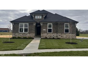 Brick house with a gray roof and walkway at 1157 Paul Revere Dr, Mooresville, IN 46158
