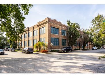 Brick building with large windows, offering ample natural light at 735 Lexington Ave # Apt 8, Indianapolis, IN 46203
