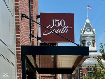 Image of the 150 South building signage with a courthouse in the background at 150 S Main St # 404, Franklin, IN 46131