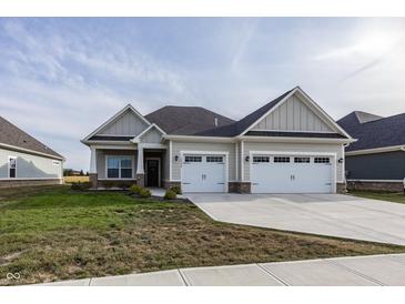 Craftsman style home with two-car garage and front porch at 1569 Tupelo Dr, Greenfield, IN 46140