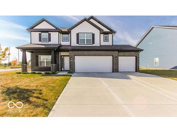 Two story home, 3-car garage, brick exterior at 10257 Meadow Path Ln, Indianapolis, IN 46239