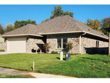Brick ranch home with attached garage and landscaping at 2170 Galleone Way, Plainfield, IN 46168