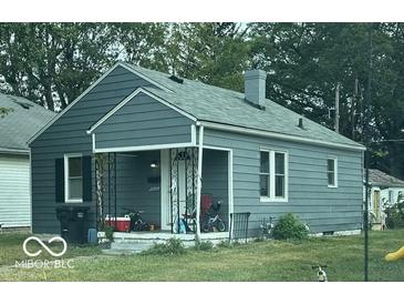 Gray house with a covered porch and small yard at 3410 Forest Ter, Anderson, IN 46013