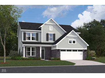 Two story house exterior with gray siding, stone accents, and a two car garage at 5714 Cloister Ln, McCordsville, IN 46055