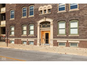 Brick apartment building with ornate entryway at 108 E St Clair St # B, Indianapolis, IN 46204