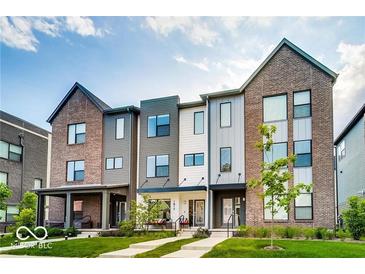 Modern three-story townhouses with front porches at 1817 N New Jersey St, Indianapolis, IN 46202