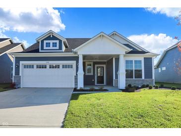 Craftsman style home with blue siding, white trim, and a two-car garage at 7149 Rose Hill Ave, Brownsburg, IN 46112