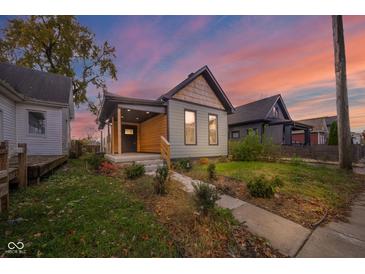 Charming craftsman home with a modern exterior and landscaped front yard at 425 Sanders St, Indianapolis, IN 46225