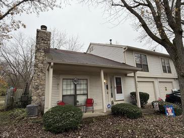 Charming condo with stone fireplace and covered porch at 3250 Valley Farms Way, Indianapolis, IN 46214