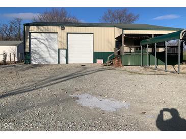 Front view of metal building with large garage door at 5800 S State Rd 37, Tipton, IN 46072
