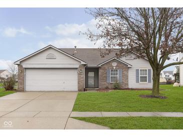 Brick ranch home with attached garage and well-maintained lawn at 2368 Black Gold Dr, Indianapolis, IN 46234