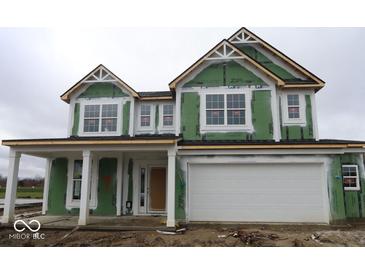 Two-story home with white siding, covered porch, and attached garage under construction at 6114 Paperbark Way, Indianapolis, IN 46259