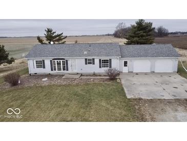 Aerial view of ranch home, detached garage, and expansive yard at 4726 E 210 N, Lebanon, IN 46052