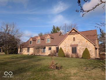 Ranch style home with stone accents and a brown roof at 501 Dorchester Dr, Noblesville, IN 46062