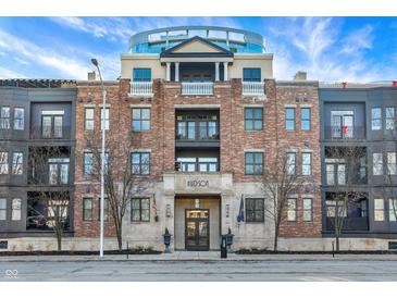 Brick building exterior, featuring multiple balconies and a grand entrance at 355 E Ohio E St # 324, Indianapolis, IN 46204