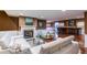 Finished basement with wet bar, hardwood floors, and a cozy fireplace at 2569 Dawn Ridge Dr, Carmel, IN 46074