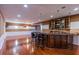 Finished basement features a large wet bar at 2569 Dawn Ridge Dr, Carmel, IN 46074