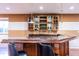 Finished basement with wet bar and hardwood floors at 2569 Dawn Ridge Dr, Carmel, IN 46074