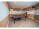 Finished basement with ping pong table, treadmill, and plenty of space for recreation at 2569 Dawn Ridge Dr, Carmel, IN 46074