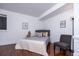 Cozy bedroom with hardwood floors and grey bedding at 2569 Dawn Ridge Dr, Carmel, IN 46074