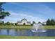 Community features a pond, fountain, and clubhouse at 2569 Dawn Ridge Dr, Carmel, IN 46074