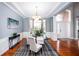 Elegant dining room with hardwood floors and a chandelier at 2569 Dawn Ridge Dr, Carmel, IN 46074