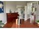 Home office with built-in shelving and hardwood floors at 2569 Dawn Ridge Dr, Carmel, IN 46074