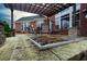 Relaxing patio area with fire pit and pergola at 2569 Dawn Ridge Dr, Carmel, IN 46074