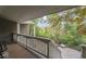 Covered porch overlooking a wooded backyard at 19431 Prairie Baptist Rd, Noblesville, IN 46060