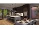 Modern kitchen with dark cabinetry, large island, and stainless steel appliances at 824 N Park Ave, Indianapolis, IN 46202