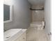 Modern bathroom with a shower and tub at 3058 Ruckle St, Indianapolis, IN 46205