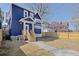 Spacious backyard with a wooden fence and a newly built deck at 412 W 11Th St, Anderson, IN 46016