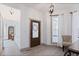 Bright entryway with tile flooring and charming window seat at 412 W 11Th St, Anderson, IN 46016