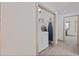 Convenient laundry room with washer, dryer, and ironing board at 412 W 11Th St, Anderson, IN 46016