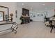 Spacious living area showcasing a modern fireplace and hardwood floors at 412 W 11Th St, Anderson, IN 46016