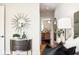 Elegant bedroom features a vanity with mirror and access to the bathroom at 41 N Rangeline Rd # 2, Carmel, IN 46032