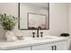 Elegant bathroom vanity with a marble countertop and black matte fixtures at 41 N Rangeline Rd # 2, Carmel, IN 46032
