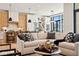 Open concept kitchen and living area with modern cabinetry and comfortable seating at 41 N Rangeline Rd # 2, Carmel, IN 46032