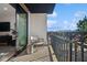 Private balcony with a chair and views of the city at 41 N Rangeline Rd # 2, Carmel, IN 46032
