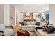 Open concept living room with a view into the kitchen at 41 N Rangeline Rd # 2, Carmel, IN 46032