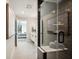 Bathroom with a walk-in shower and dark tile accent wall at 41 N Rangeline Rd # 2, Carmel, IN 46032