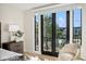 Bedroom with balcony access and plenty of natural light at 41 N Rangeline Rd # 2, Carmel, IN 46032