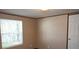 Bright bedroom with a window and white door at 31 Blue Water Dr, Cicero, IN 46034