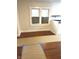 Dining area with hardwood floors and windows at 2620 Brookway St, Indianapolis, IN 46218