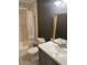 Modern bathroom with gray vanity, white subway tile and patterned floor at 4899 N 500 W, Bargersville, IN 46106