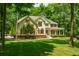 Two-story house with large yard and mature trees at 1104 W Greencastle Road, Mooresville, IN 46158